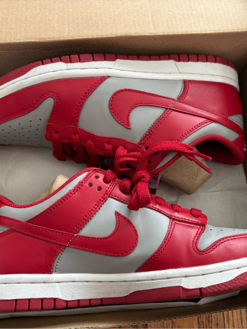 Red and grey Nike dunks
